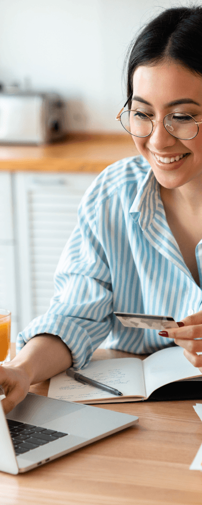 Lady checking a debit card account number